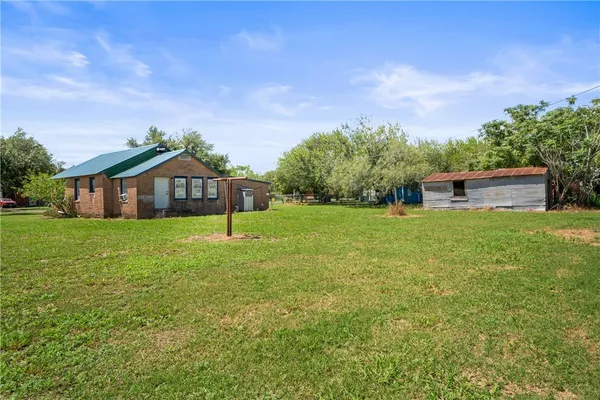 a house view with a garden space