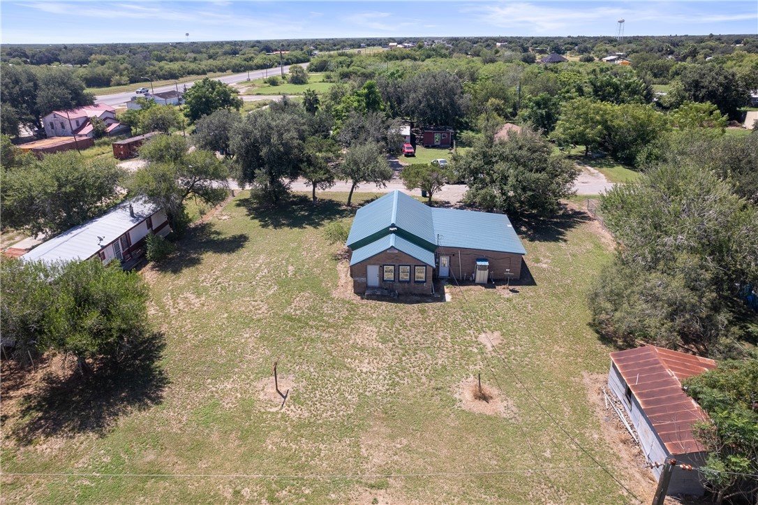 128 Northwest 6th Street Premont, TX 78375 - Photo 4 of 15 an aerial view of a house with a yard