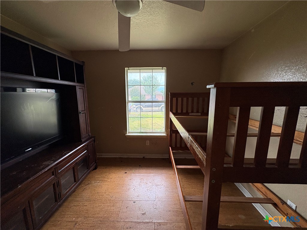 206 Timber Ridge Drive Nolanville, TX 76559 - Photo 13 of 21 a living room with furniture and a flat screen tv