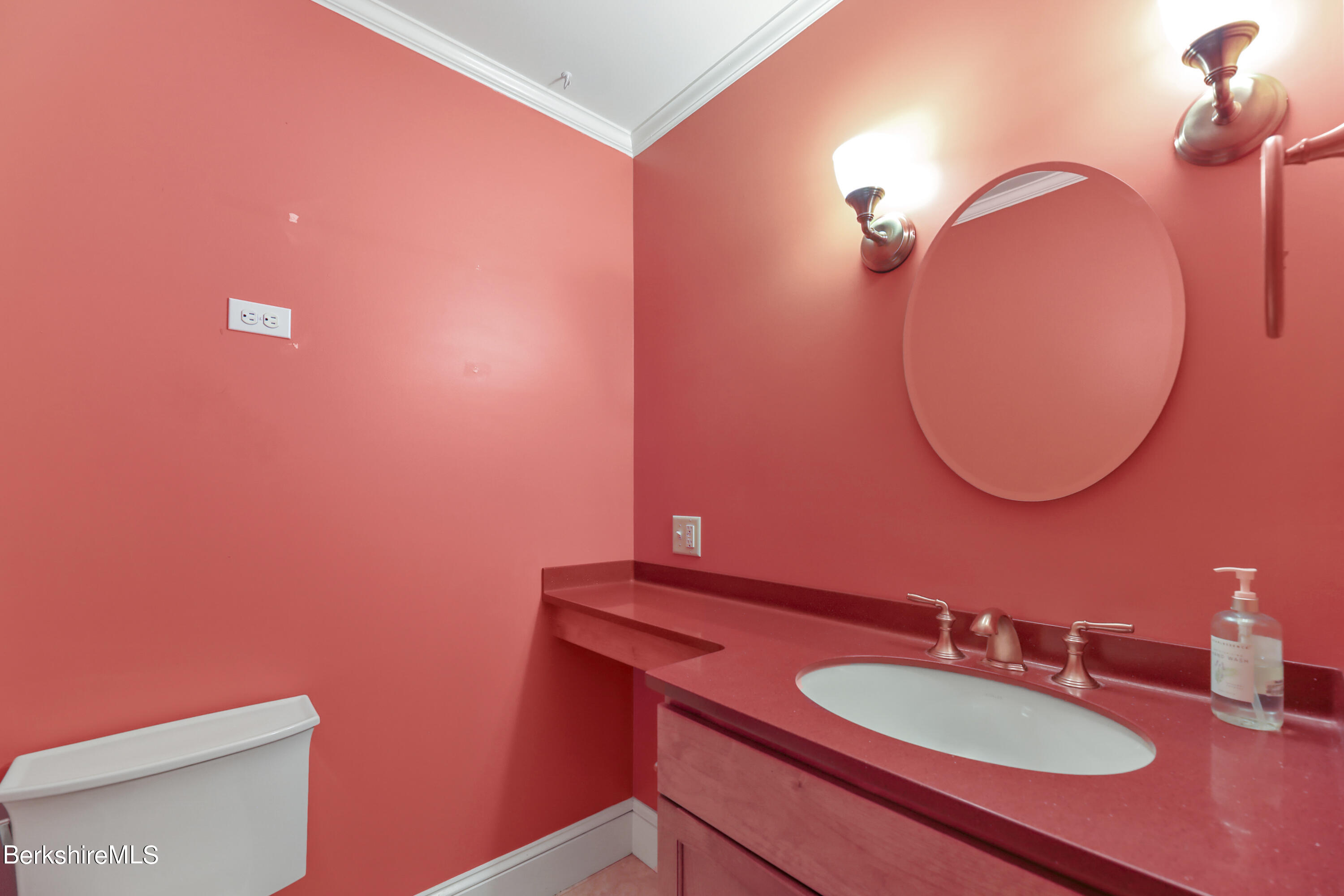 7 Fern Hill Road Great Barrington, MA 01230 - Photo 24 of 60 a bathroom with a sink a mirror and a toilet