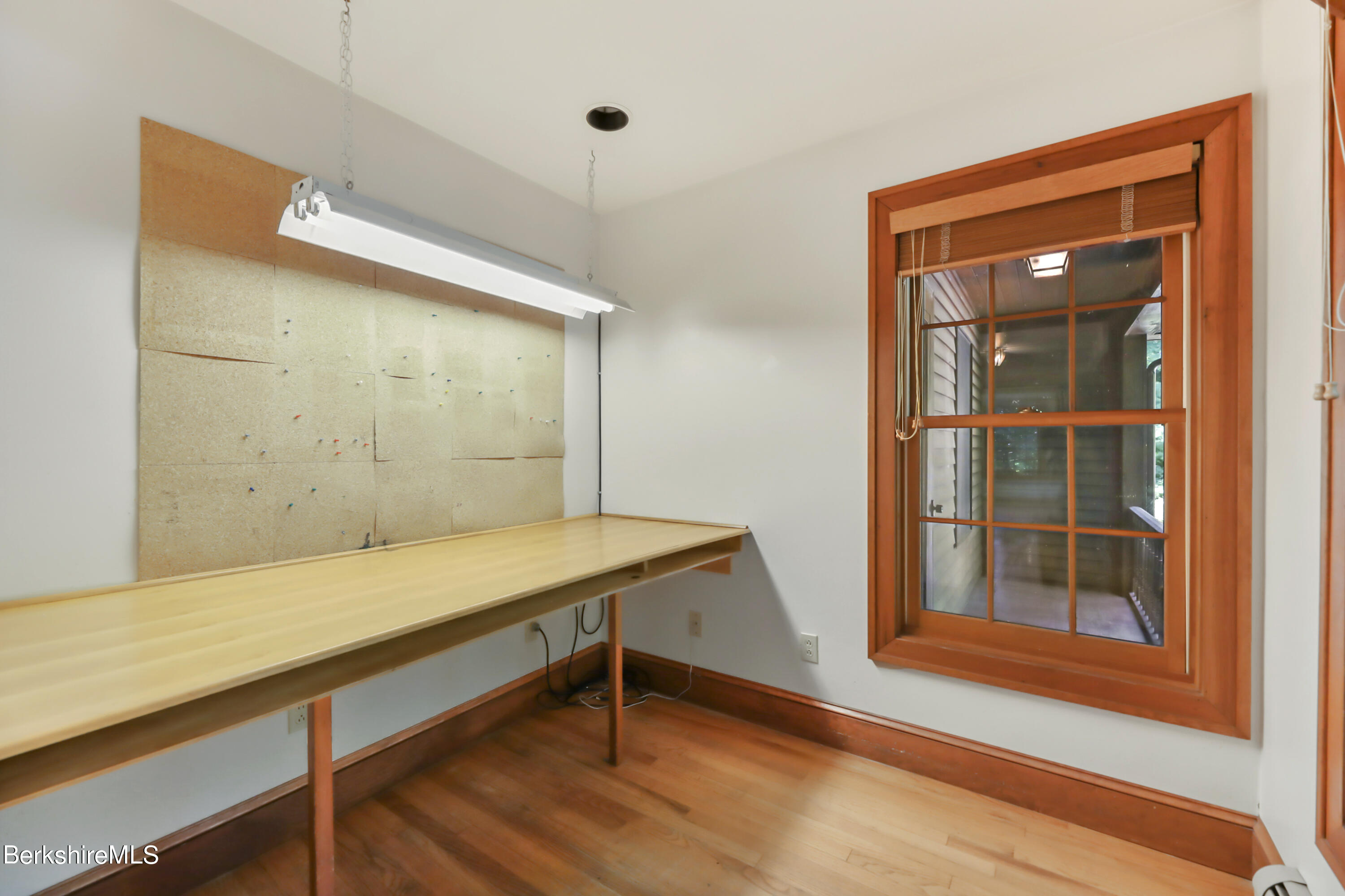 7 Fern Hill Road Great Barrington, MA 01230 - Photo 25 of 60 a room that has a bed and a window