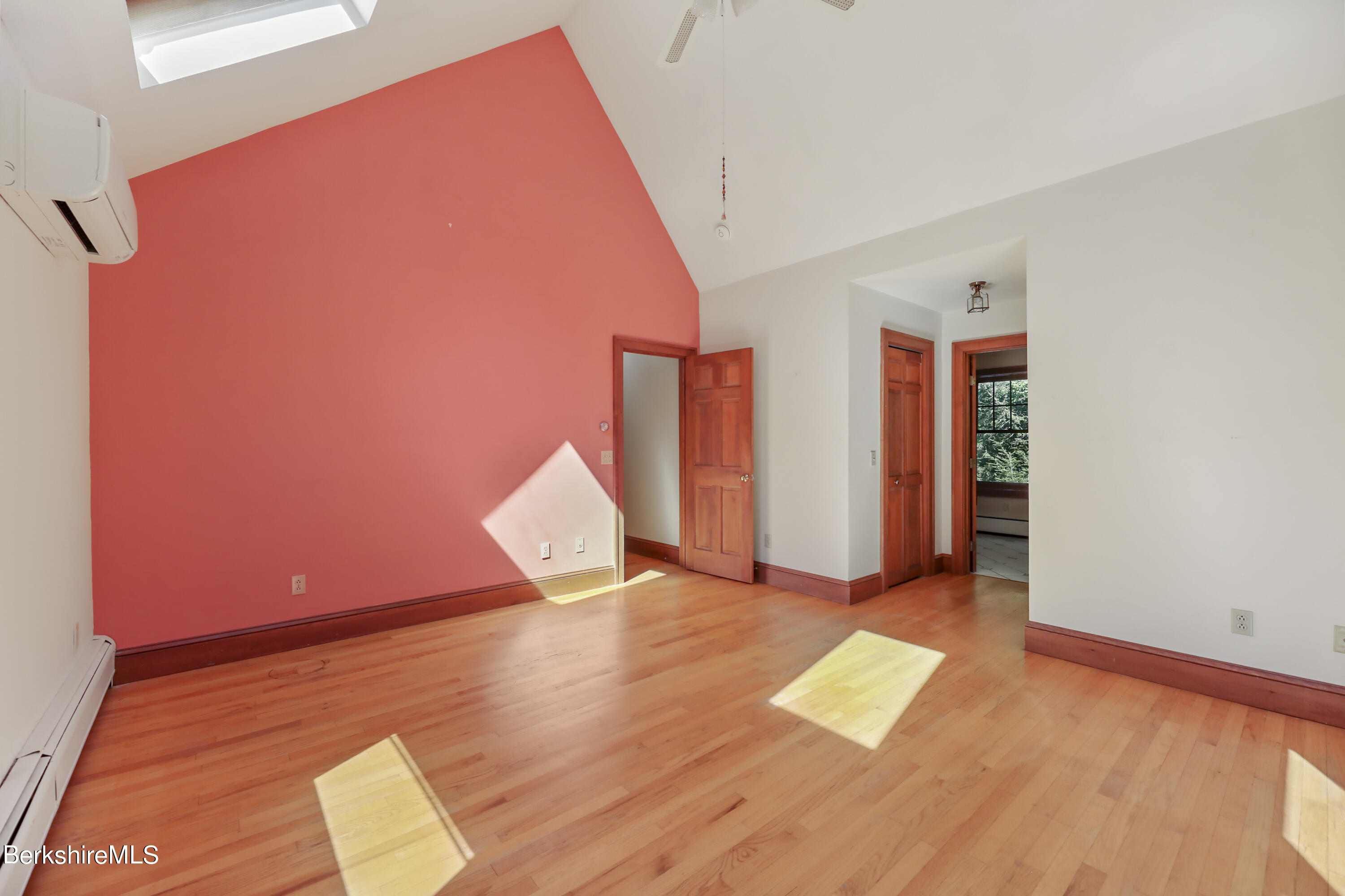 7 Fern Hill Road Great Barrington, MA 01230 - Photo 28 of 60 a view of an empty room and wooden floor