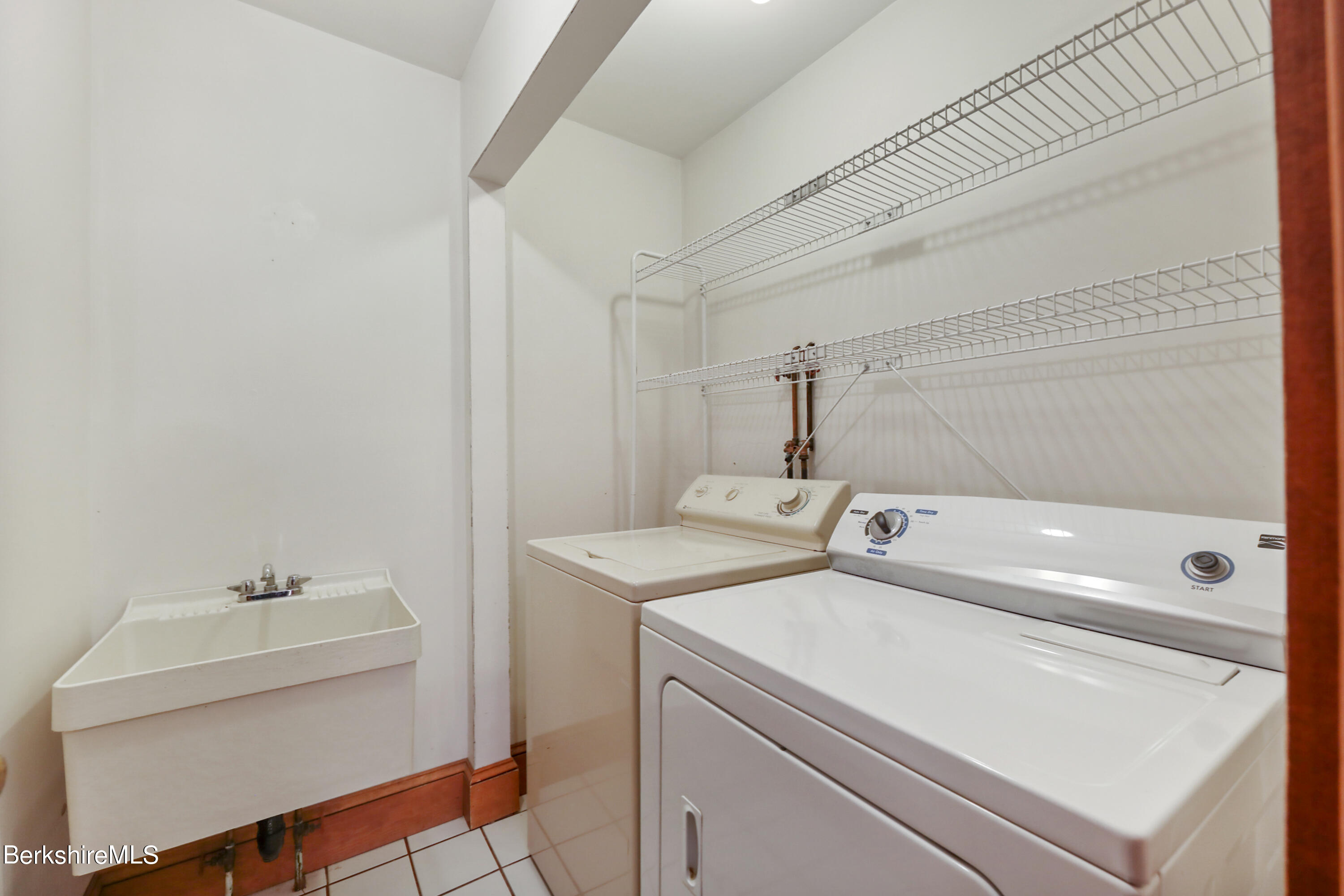 7 Fern Hill Road Great Barrington, MA 01230 - Photo 39 of 60 a utility room with dryer and washer
