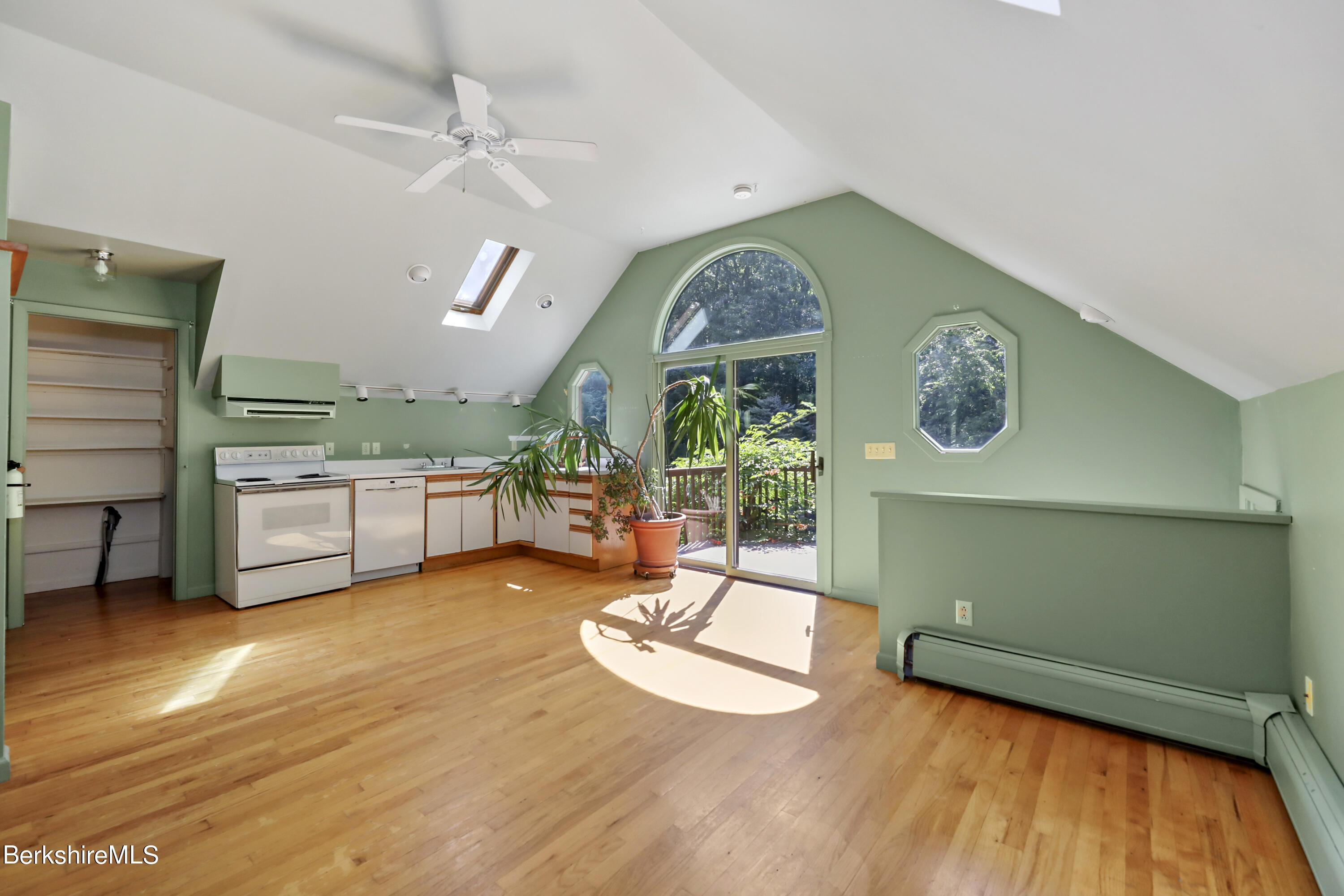 7 Fern Hill Road Great Barrington, MA 01230 - Photo 43 of 60 a view of a room with gym equipment and a large window