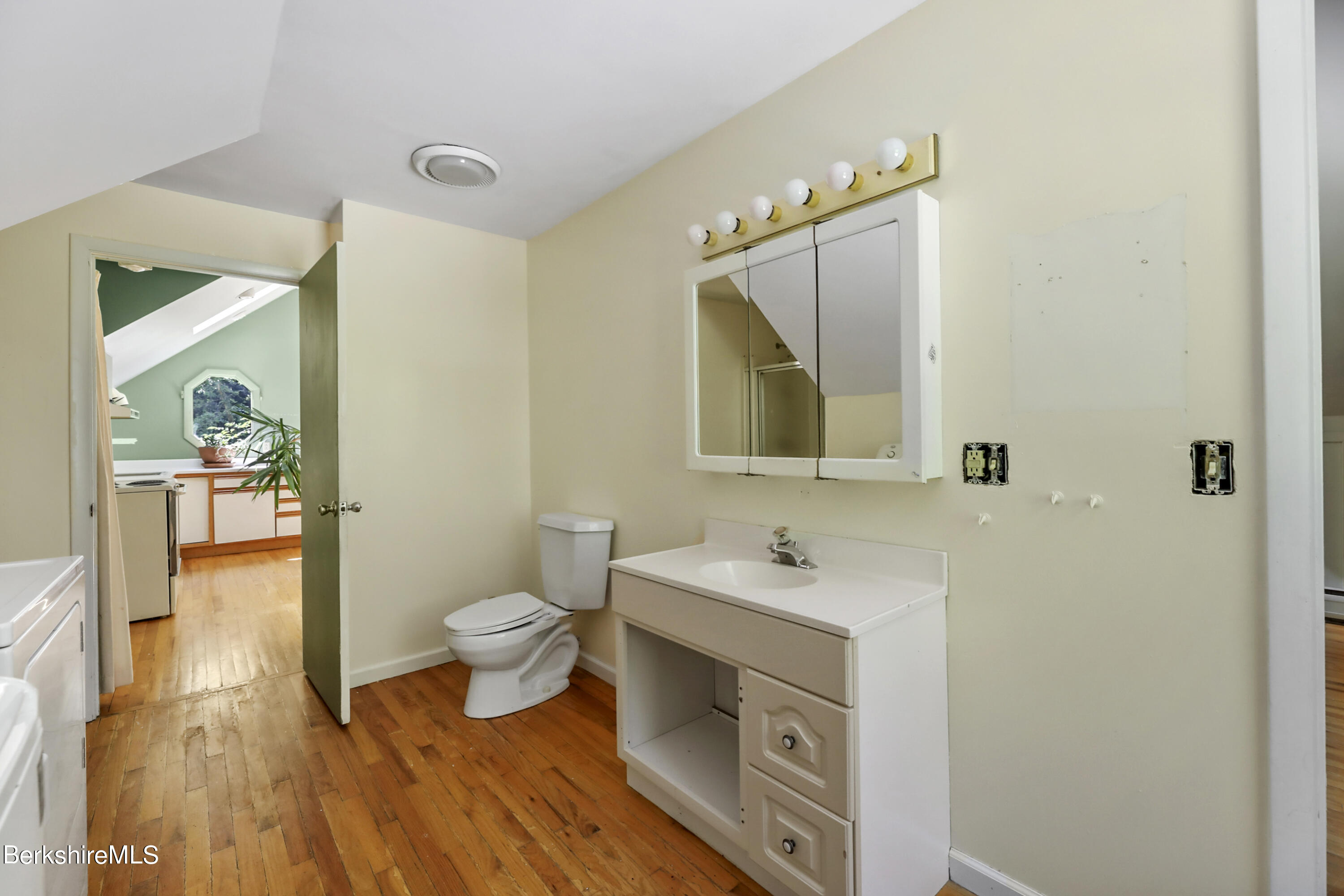 7 Fern Hill Road Great Barrington, MA 01230 - Photo 48 of 60 a bathroom with a toilet sink and mirror