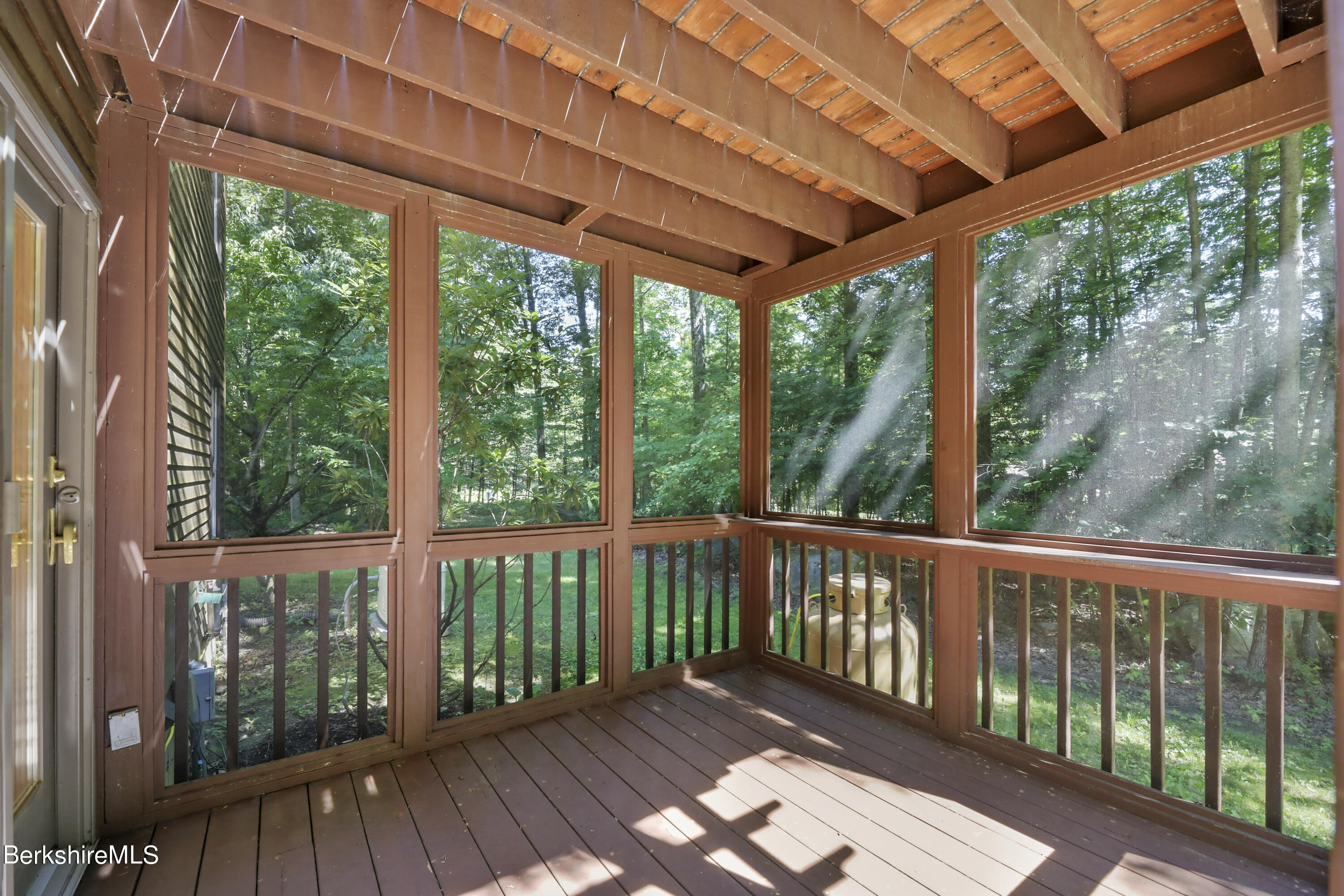 7 Fern Hill Road Great Barrington, MA 01230 - Photo 51 of 60 a view of a wooden deck next to a yard