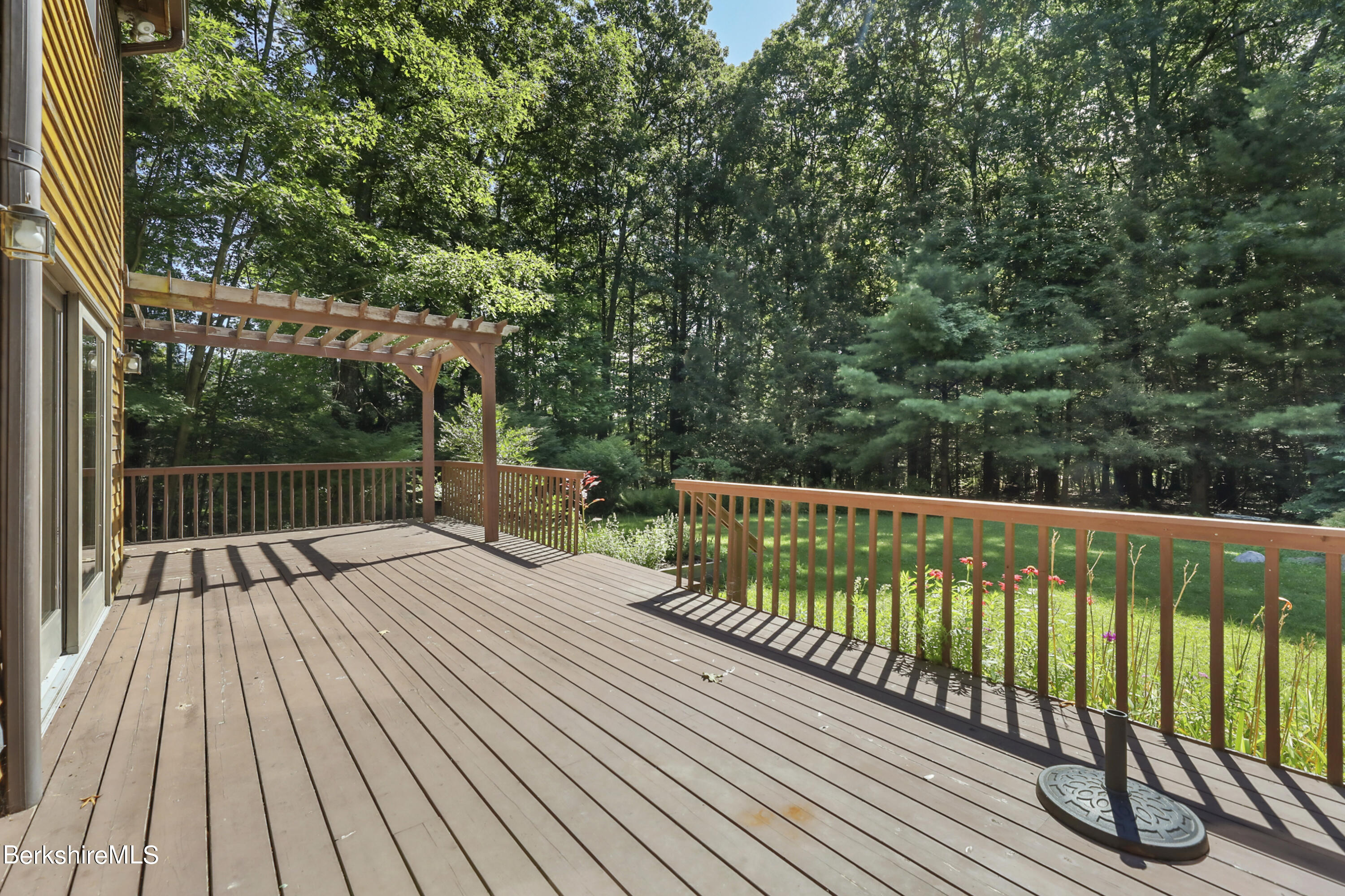 7 Fern Hill Road Great Barrington, MA 01230 - Photo 53 of 60 a view of balcony with wooden floor and fence