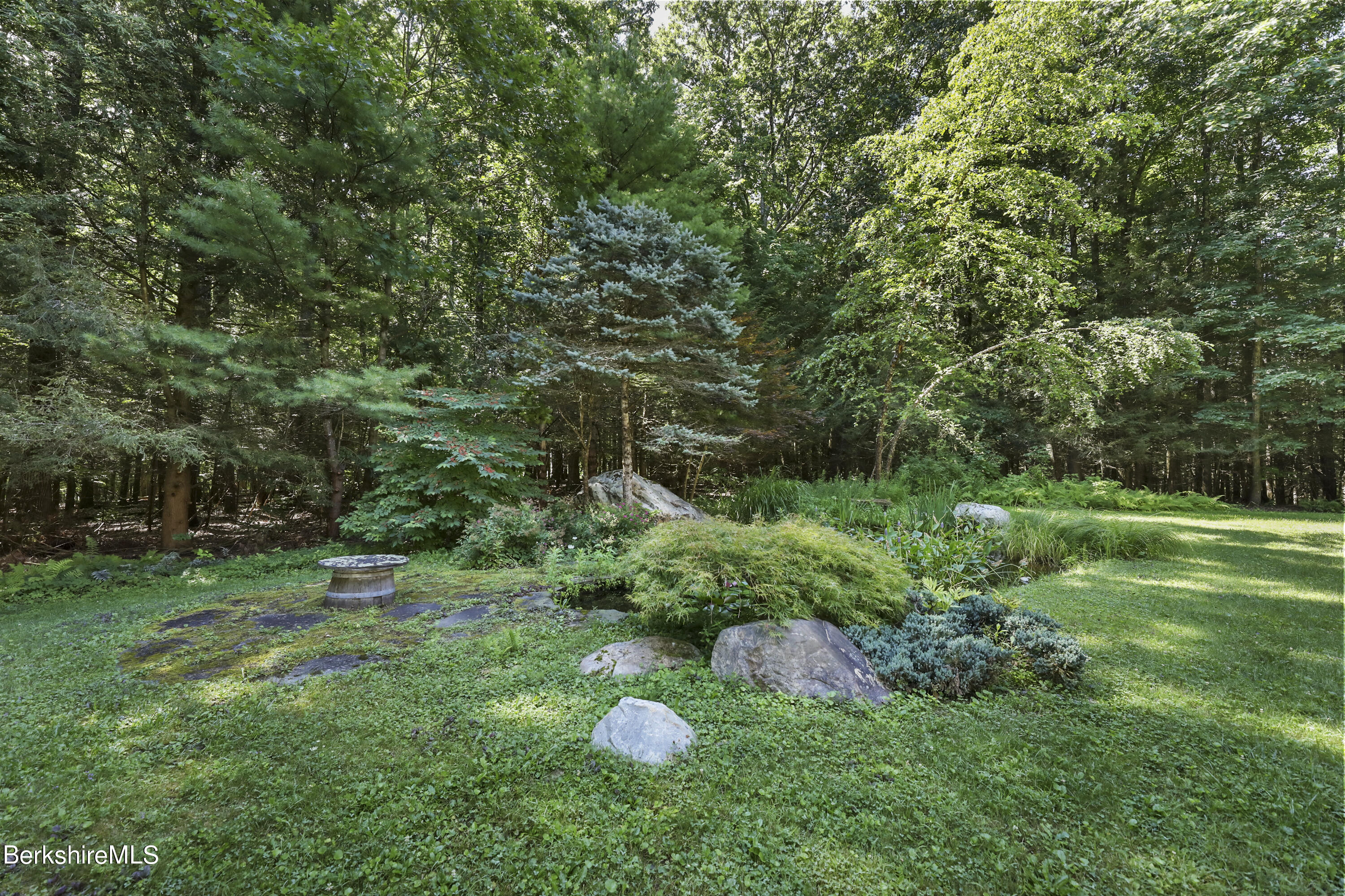 7 Fern Hill Road Great Barrington, MA 01230 - Photo 55 of 60 a backyard of a house with lots of green space