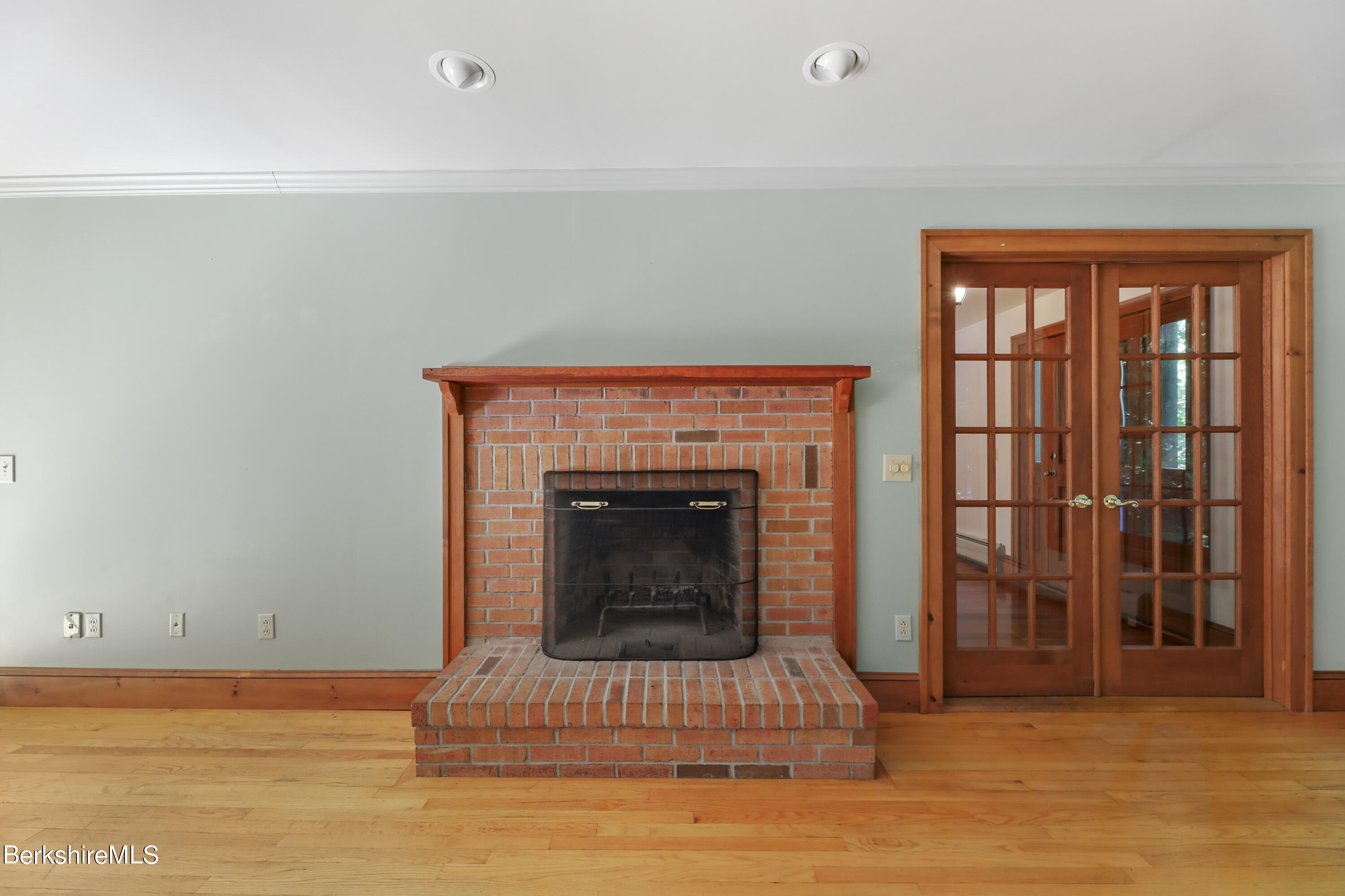 7 Fern Hill Road Great Barrington, MA 01230 - Photo 10 of 60 a living room with a fireplace