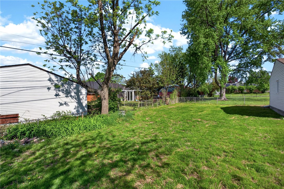 5975 Rosalie Road Dayton, OH 45424 - Photo 38 of 48 Expansive green space offers a serene environment for outdoor enjoyment.