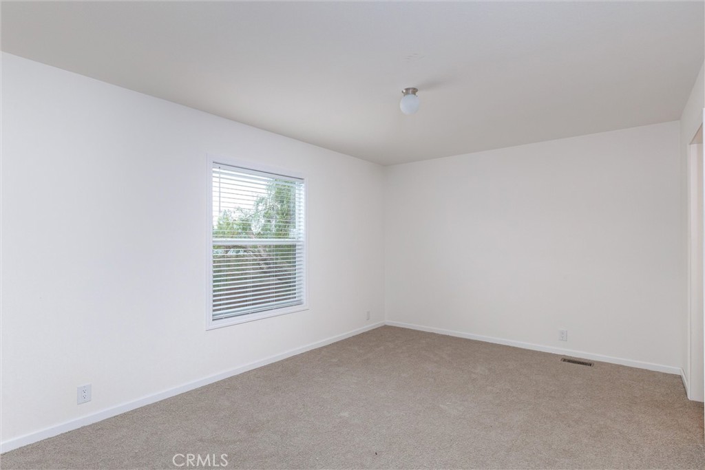 1255 Orcutt Road, Unit A11 San Luis Obispo, CA 93401 - Photo 15 of 22 an empty room with a window