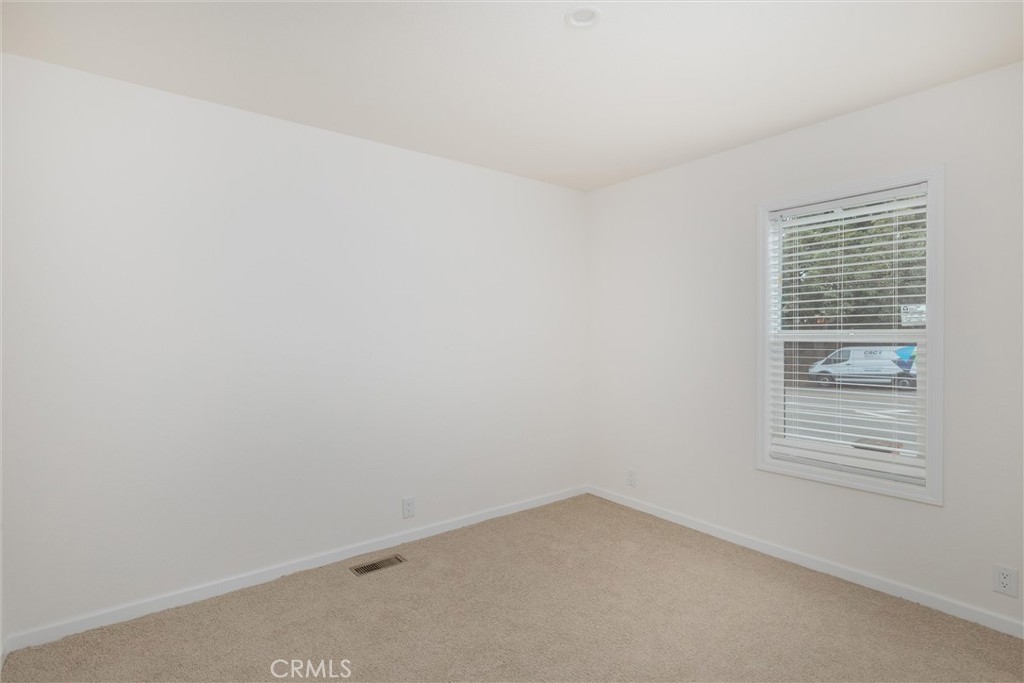 1255 Orcutt Road, Unit A11 San Luis Obispo, CA 93401 - Photo 16 of 22 a view of an empty room with a window