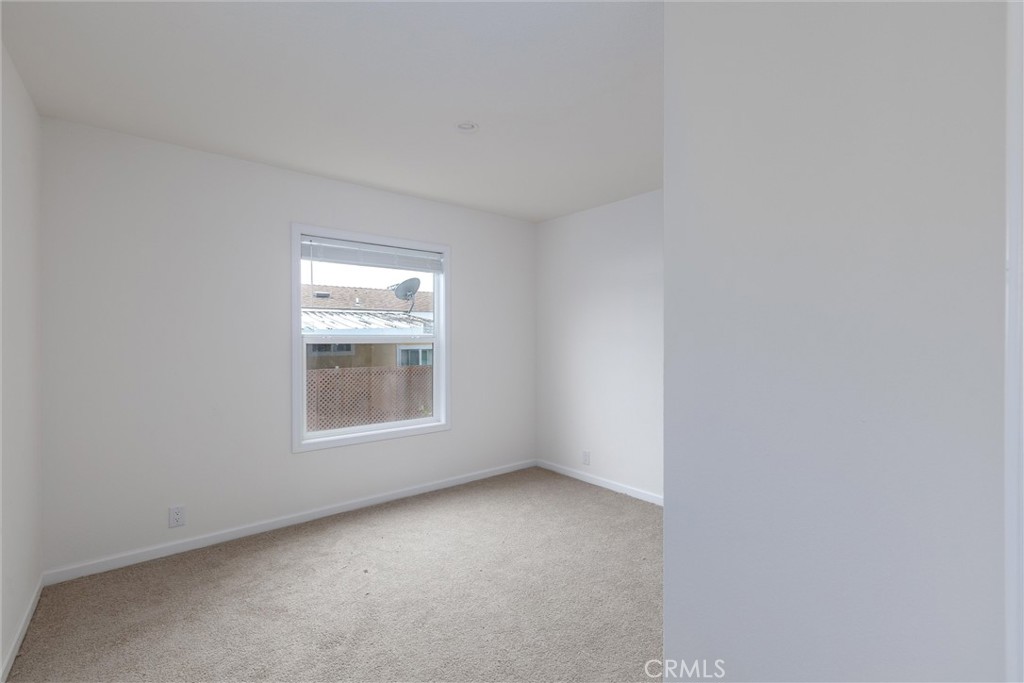 1255 Orcutt Road, Unit A11 San Luis Obispo, CA 93401 - Photo 22 of 22 an empty room with a window