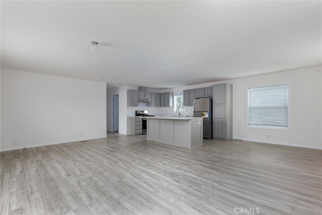 1255 Orcutt Road, Unit A11 San Luis Obispo, CA 93401 - Photo 9 of 22 a view of a kitchen with wooden floor