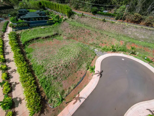 a view of a lake with a yard