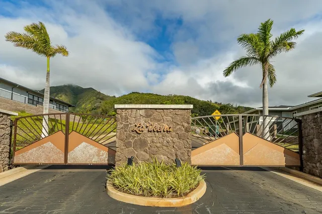 a view of a swimming pool with a table and chairs