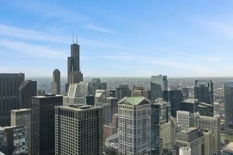 a view of a city with tall buildings