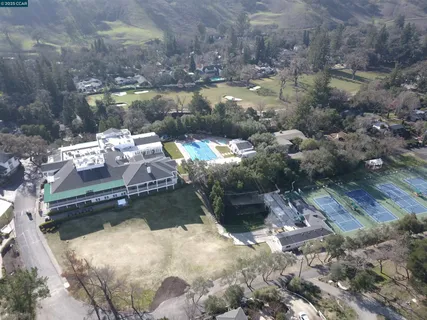 a front view of a house with garage