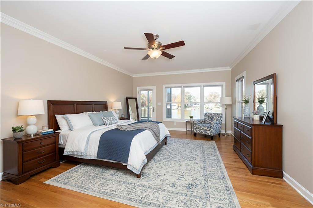 1851 Waterford Pointe Road Lexington, NC 27292 - Photo 28 of 49 Primary bedroom virtually staged, notice the view of the lake