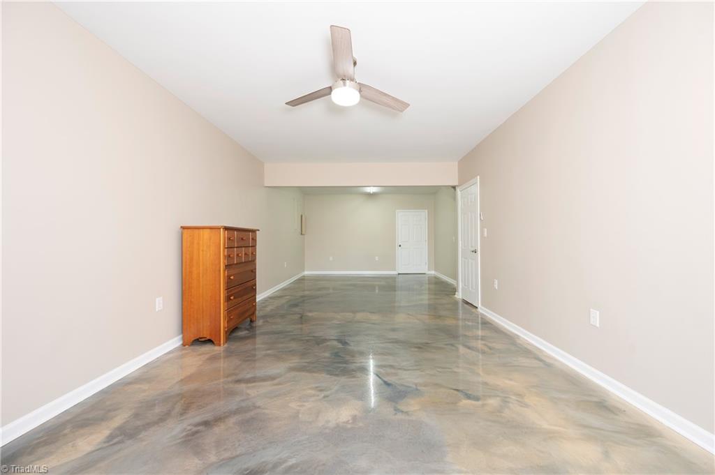 1851 Waterford Pointe Road Lexington, NC 27292 - Photo 37 of 49 This is an finished room on the lower level that is not heated and cooled, therefore not added is the square footage.