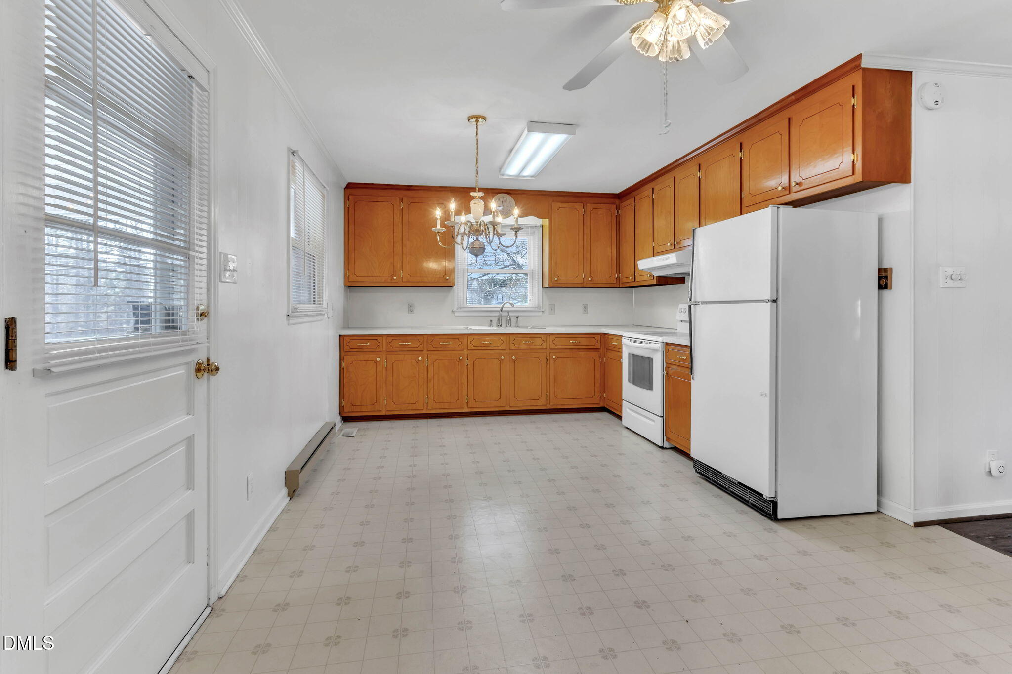 1828 Fletchers Chapel Road Durham, NC 27703 - Photo 2 of 36 a view of kitchen with furniture and a window