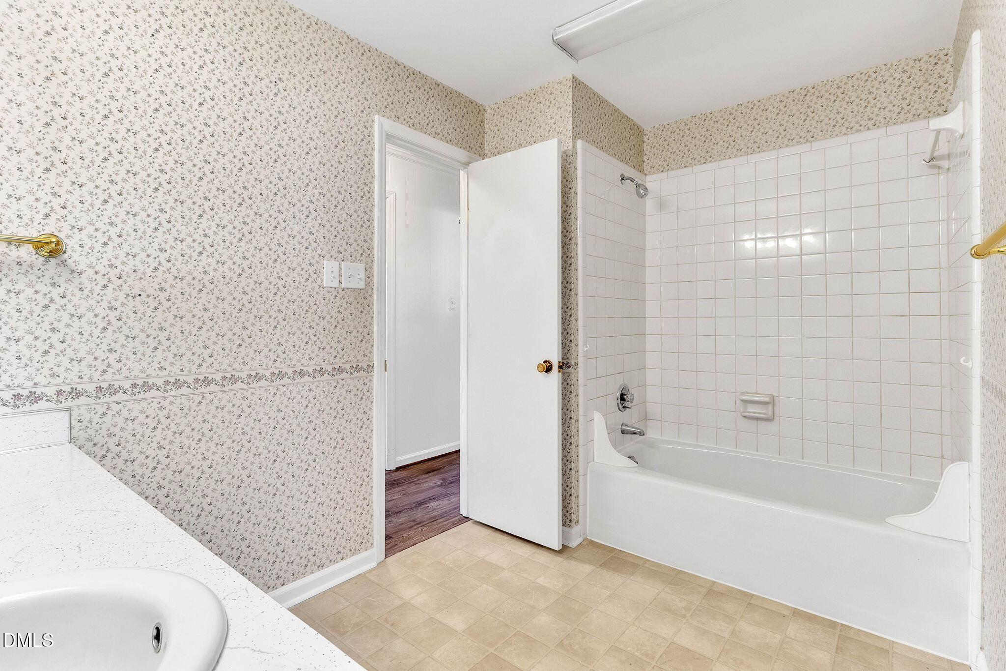 1828 Fletchers Chapel Road Durham, NC 27703 - Photo 22 of 36 a bathroom with a bathtub and a shower