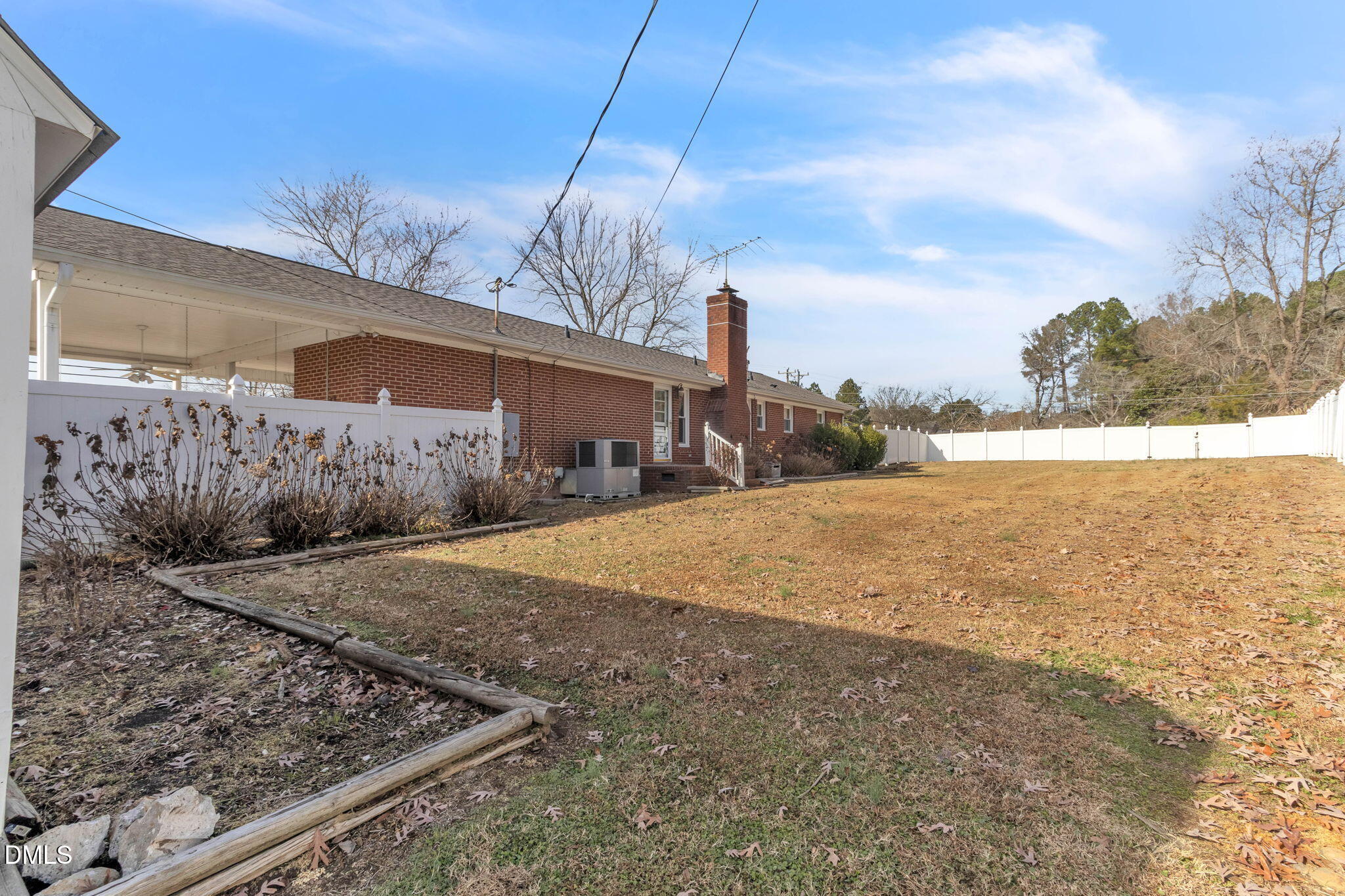 1828 Fletchers Chapel Road Durham, NC 27703 - Photo 23 of 36 a view of a backyard of the house