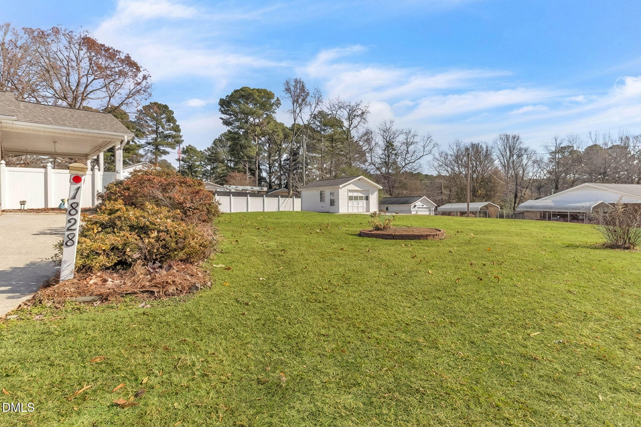 1828 Fletchers Chapel Road Durham, NC 27703 - Photo 32 of 36 a view of a lake with a big yard
