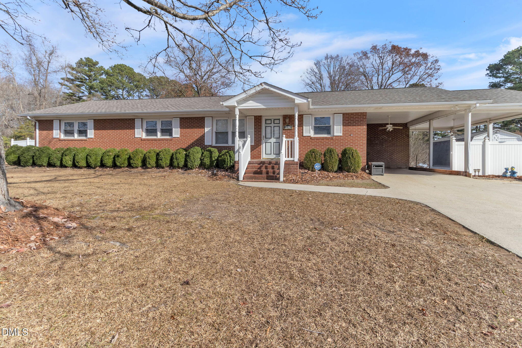 1828 Fletchers Chapel Road Durham, NC 27703 - Photo 34 of 36 front view of a house with a patio
