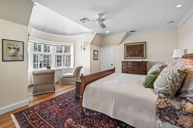a living room with furniture and windows