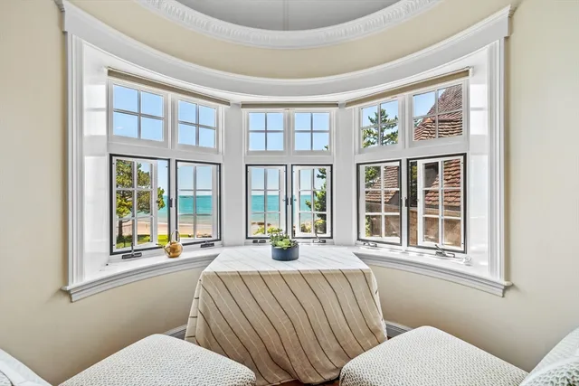 a bathroom with a granite countertop double vanity sink and a mirror