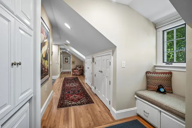 a view of a patio with couches table and chairs and potted plants