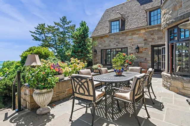 a view of a swimming pool with a lounge chair