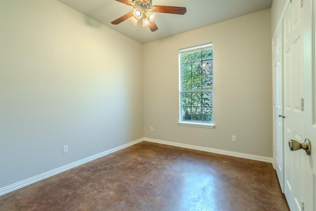 403 Summer Tree Lane Springtown, TX 76082 - Photo 10 of 19 Bedroom featuring a ceiling fan and fresh paint