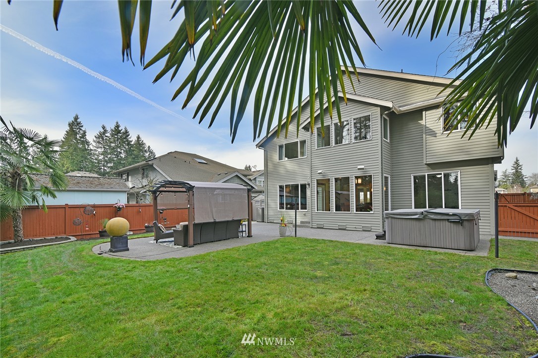 22548 5th Place West Bothell, WA 98021 - Photo 11 of 38 a front view of house with yard and outdoor seating