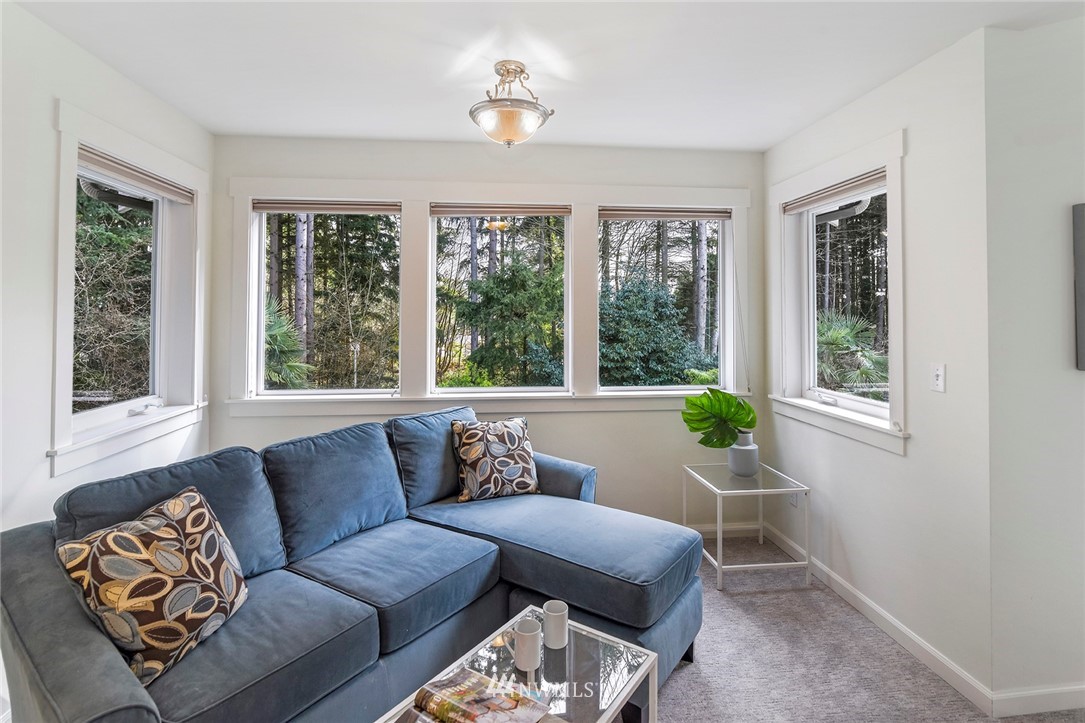 22548 5th Place West Bothell, WA 98021 - Photo 29 of 38 a living room with furniture and a window