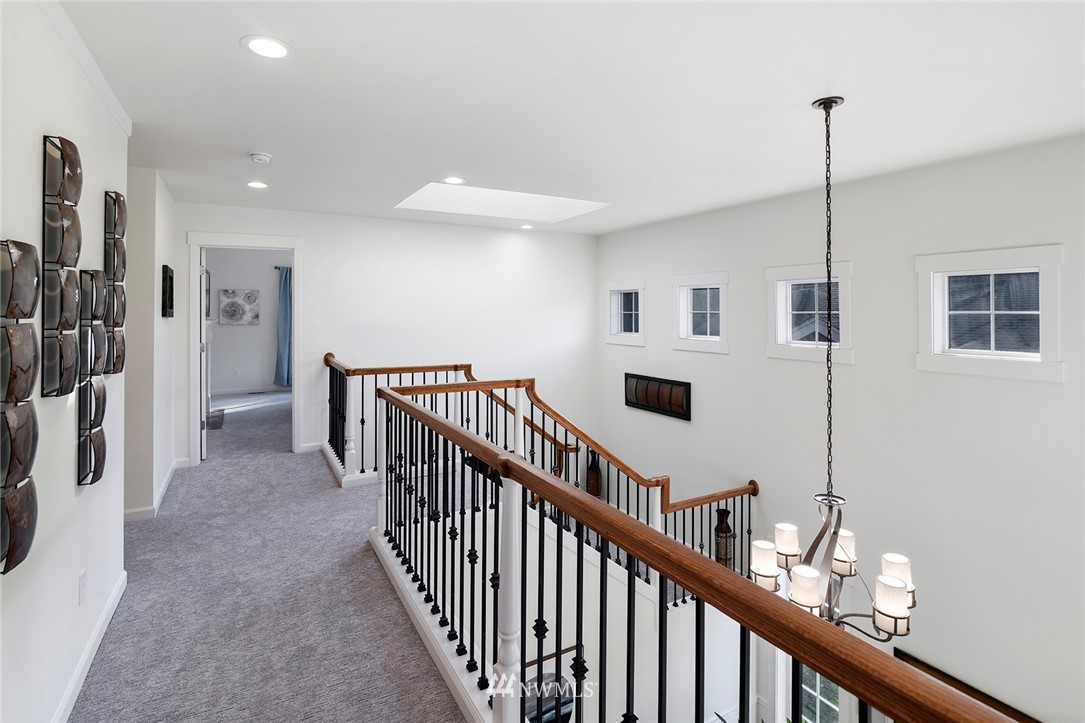 22548 5th Place West Bothell, WA 98021 - Photo 34 of 38 a view of a hallway with windows