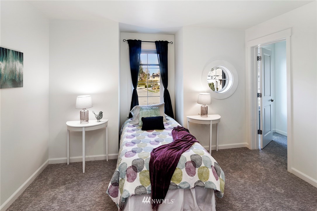 22548 5th Place West Bothell, WA 98021 - Photo 35 of 38 a bedroom with a bed and a window