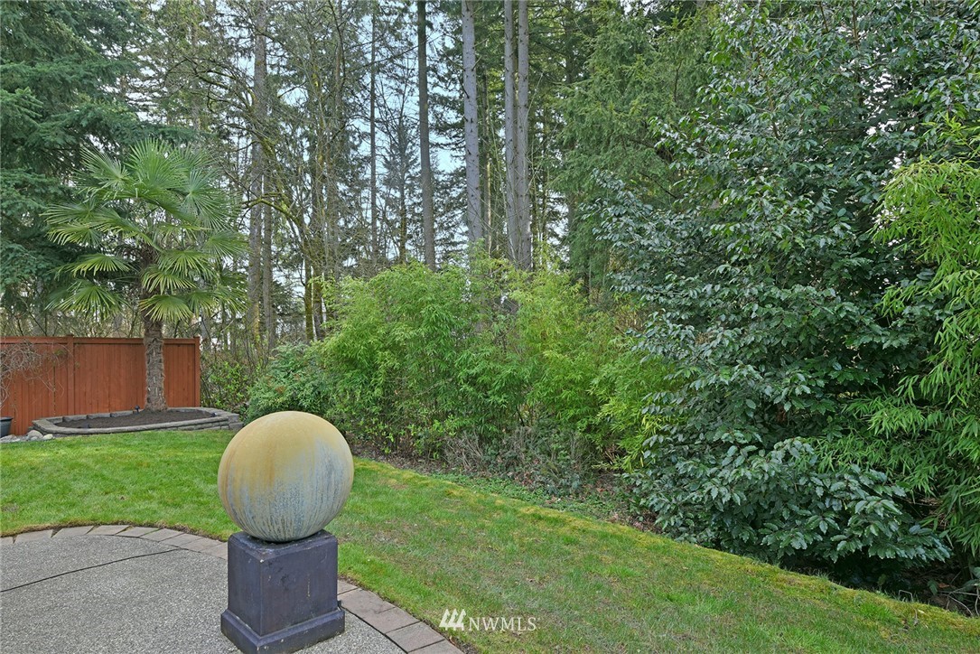22548 5th Place West Bothell, WA 98021 - Photo 10 of 38 a view of a wooden fence and trees