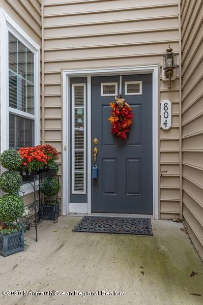 804 Abby Road Middletown, NJ 07748 - Photo 19 of 19 a front view of a house with plants