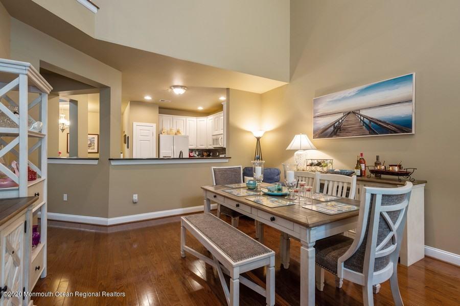 804 Abby Road Middletown, NJ 07748 - Photo 5 of 19 a view of a dining room with furniture and wooden floor