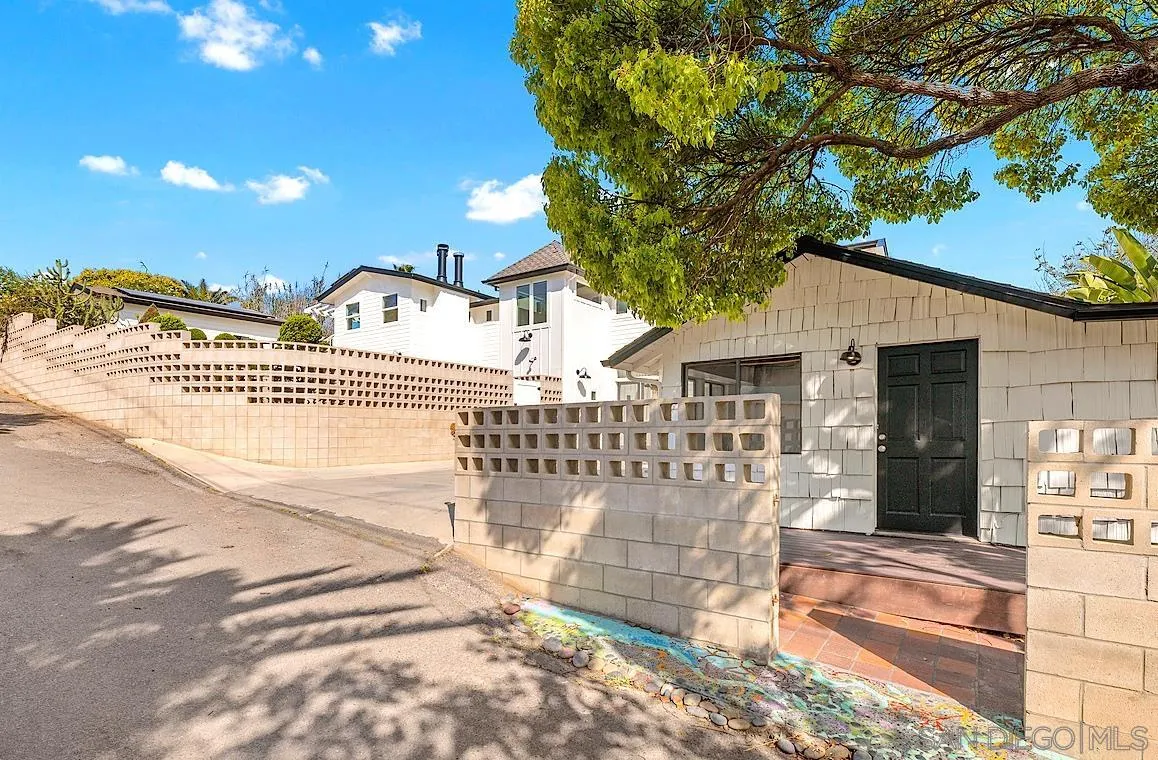 140 Range Street Encinitas, CA 92024 - Photo 2 of 51 a front view of a house with a yard