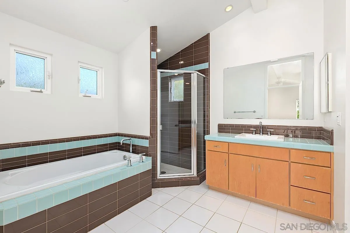 140 Range Street Encinitas, CA 92024 - Photo 24 of 51 a spacious bathroom with a bathtub and a sink