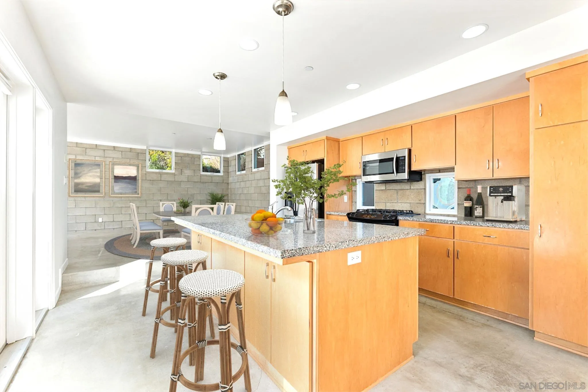 140 Range Street Encinitas, CA 92024 - Photo 9 of 51 a kitchen with stainless steel appliances kitchen island granite countertop a sink and cabinets