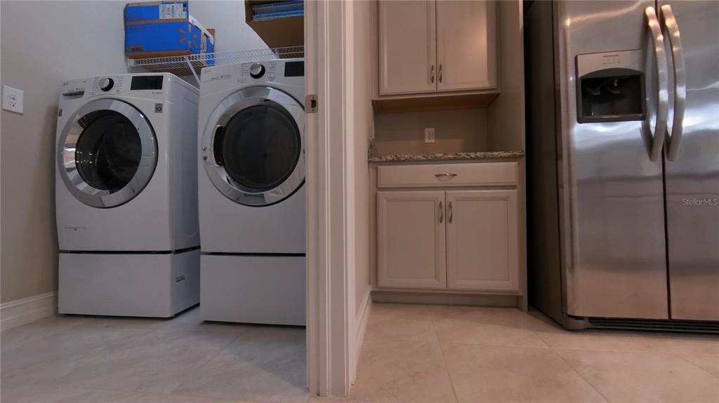 25326 Tether Lane Punta Gorda, FL 33983 - Photo 12 of 19 a utility room with dryer and washer