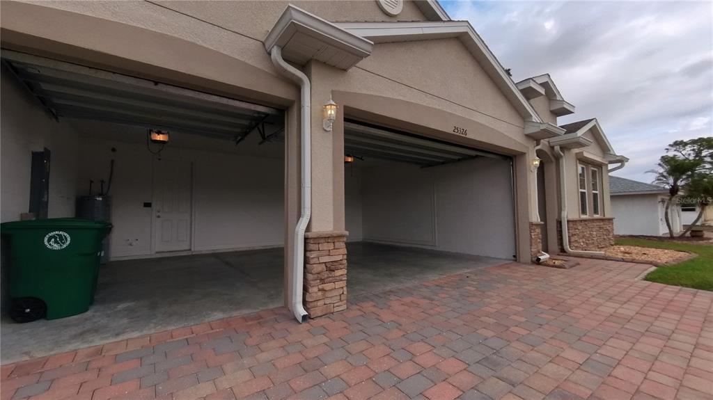 25326 Tether Lane Punta Gorda, FL 33983 - Photo 16 of 19 a view of a house with a garage