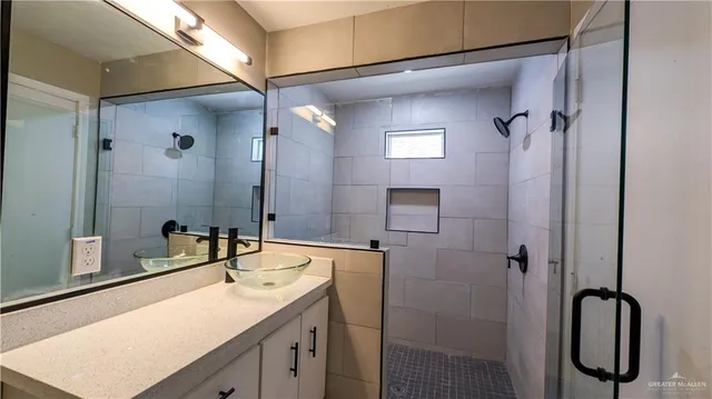 en empty room with a ceiling fan and a ceiling fan