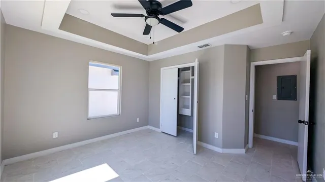 a view of room with ceiling fan