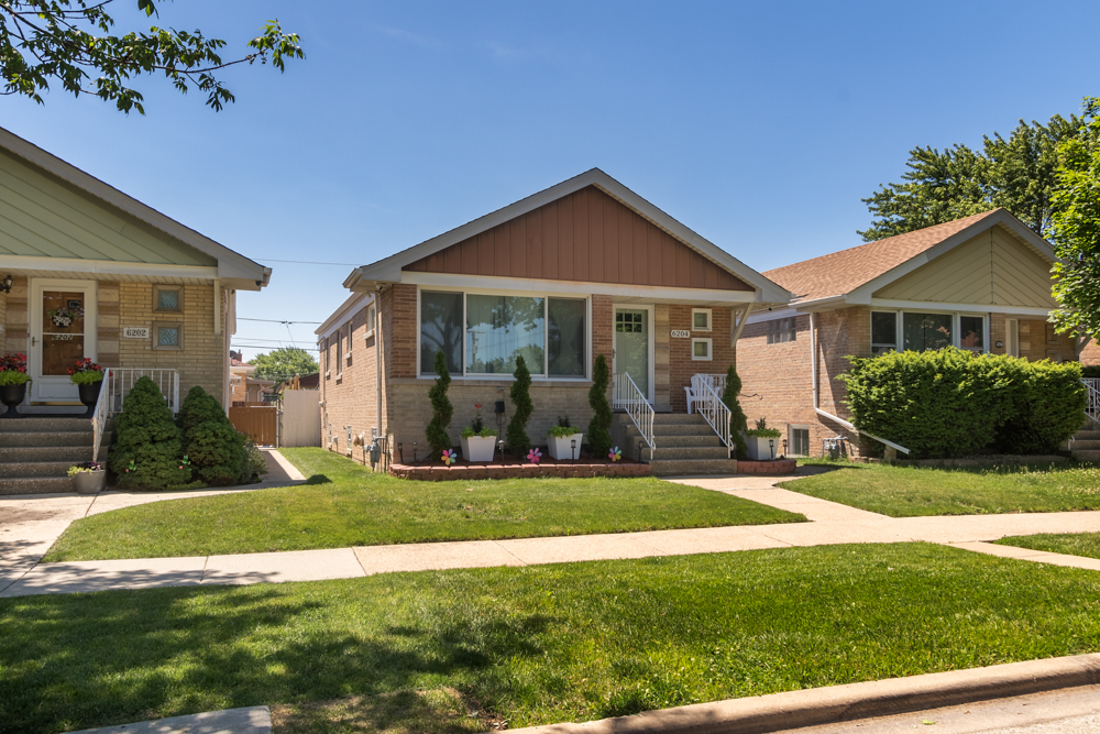 6204 35th Street Berwyn, IL 60402 - Photo 27 of 30 a view of a house with a yard