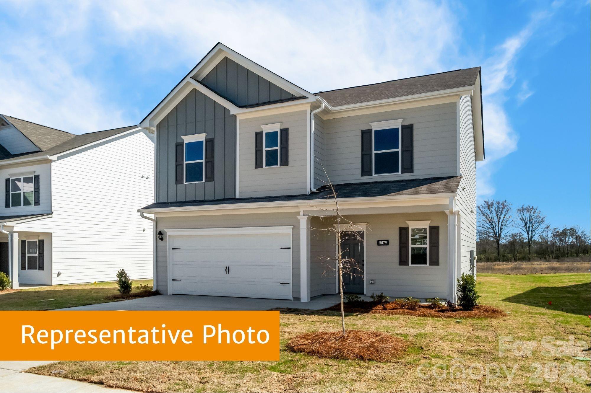 5423 Arnold Way Concord, NC 28025 - Photo 1 of 19 a front view of a house with a yard